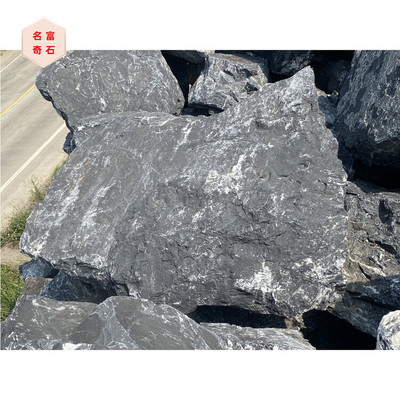 香港庭院造景石-花園小區點綴石-假山流水制作石材-噸位黑山石